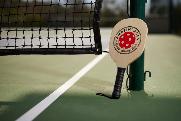 Wood Pickleball Paddle on Pickleball Court
